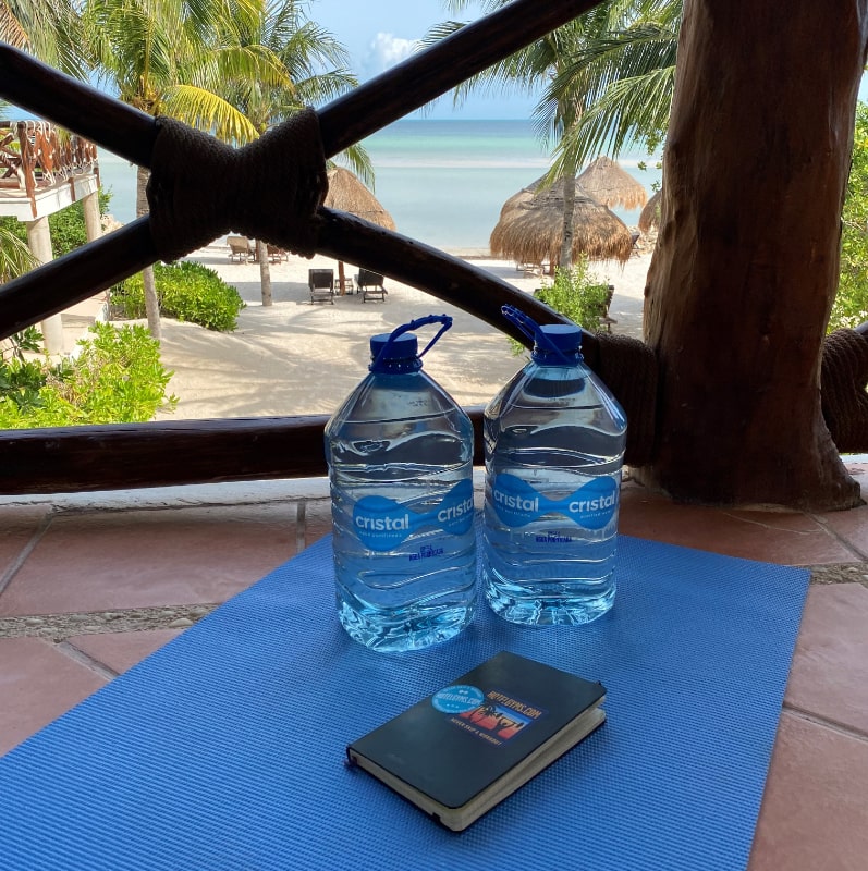 Water bottles as dumbbells alternative